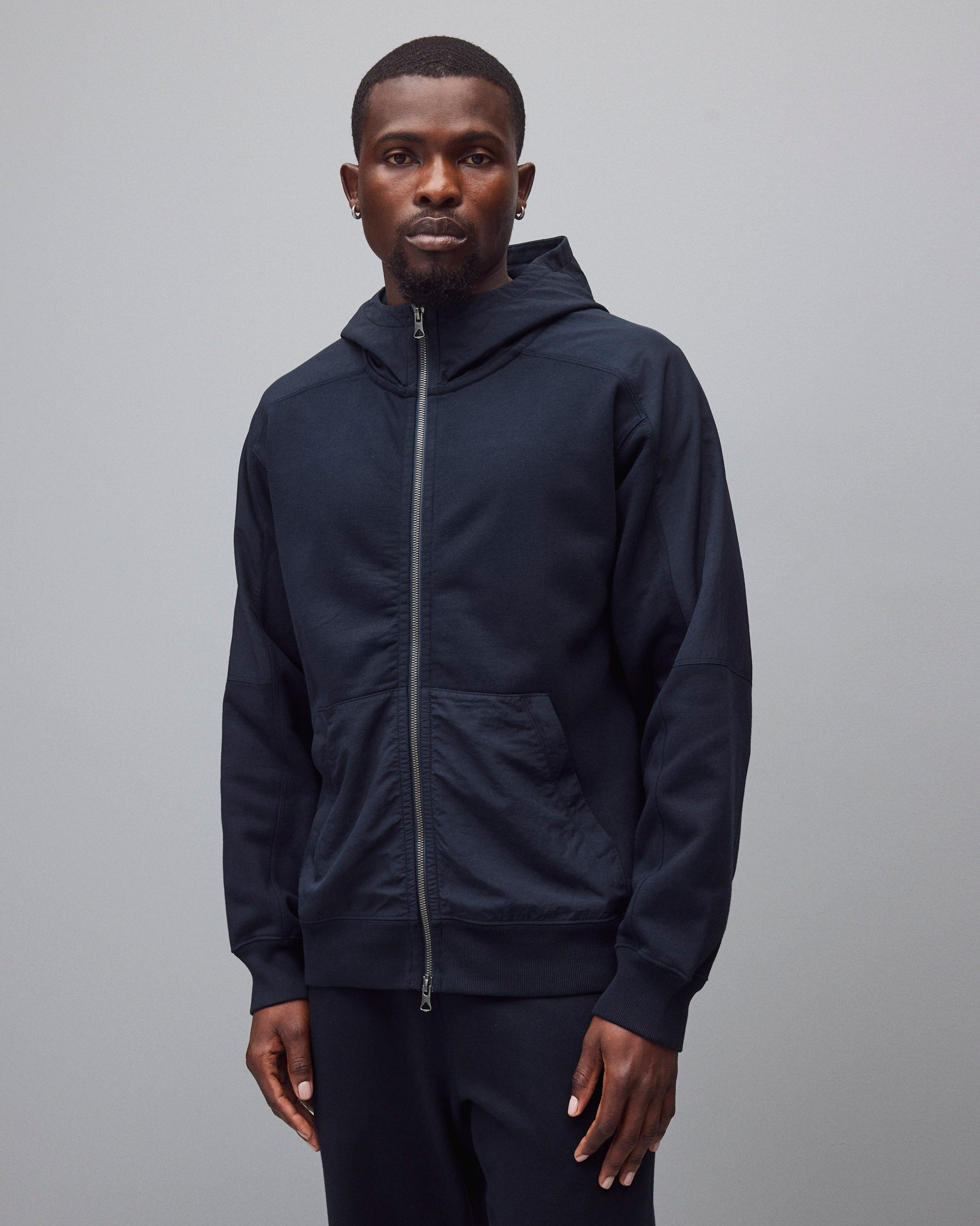 REIGNING CHAMP ウインドブレーカー ジップアップブルゾン ネイビー Midweight Terry Defender Standard Zip Hoodie | Reigning Champ