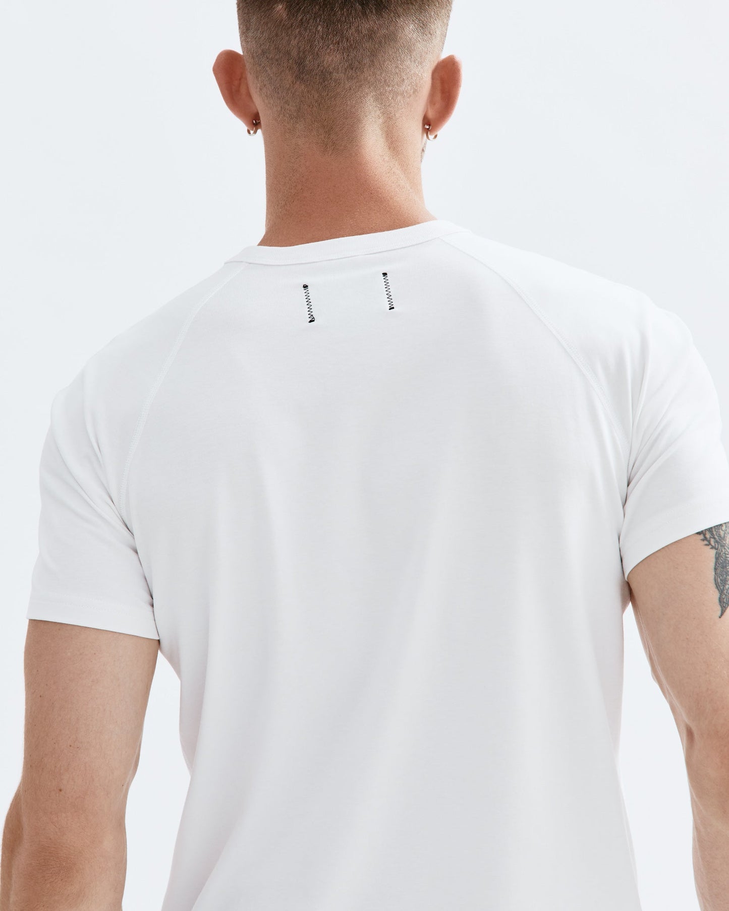 https://reigningchamp.com/cdn/shop/products/RC_1169_White_Copper_Jersey_Tee_3058.jpg?v=1710720015&width=1445