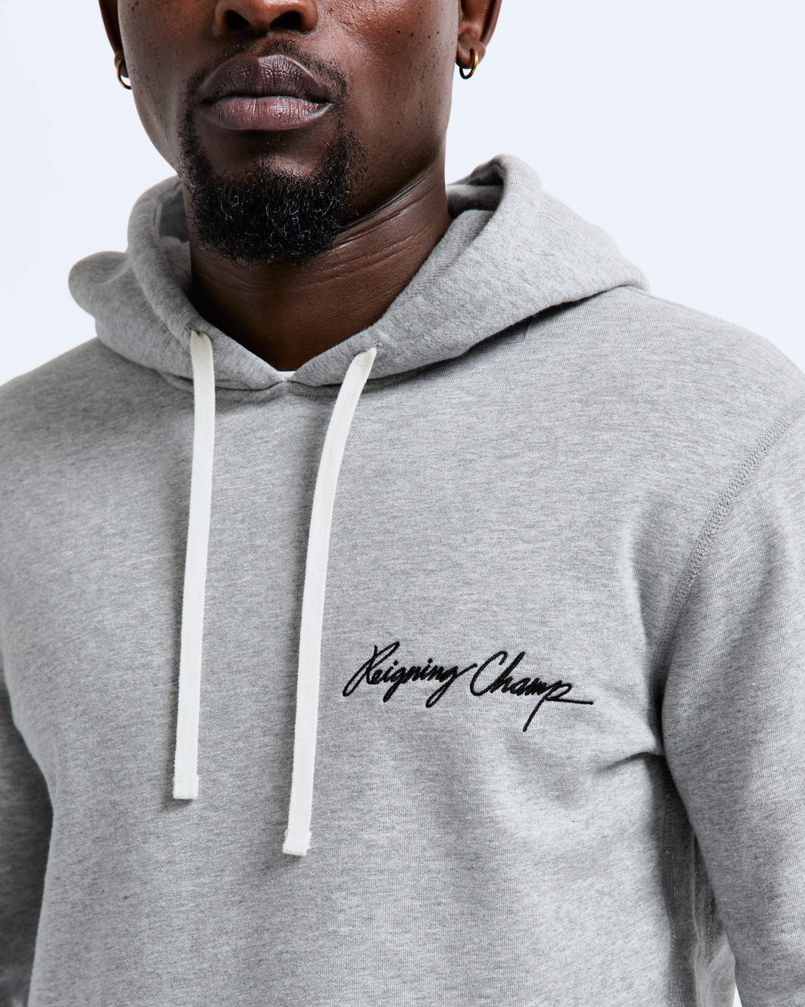 Reigning champ embroidered hot sale hoodie