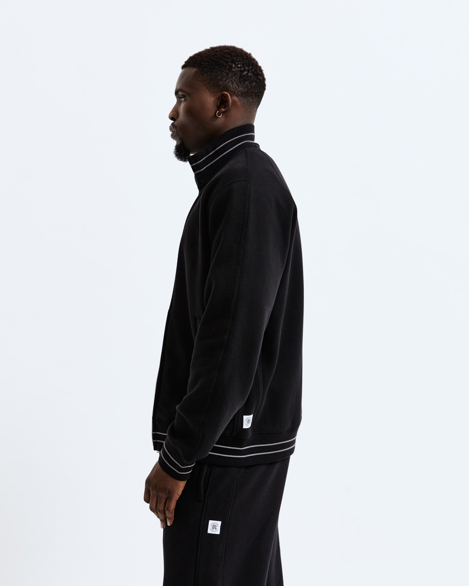 Reigning champ track jacket sale