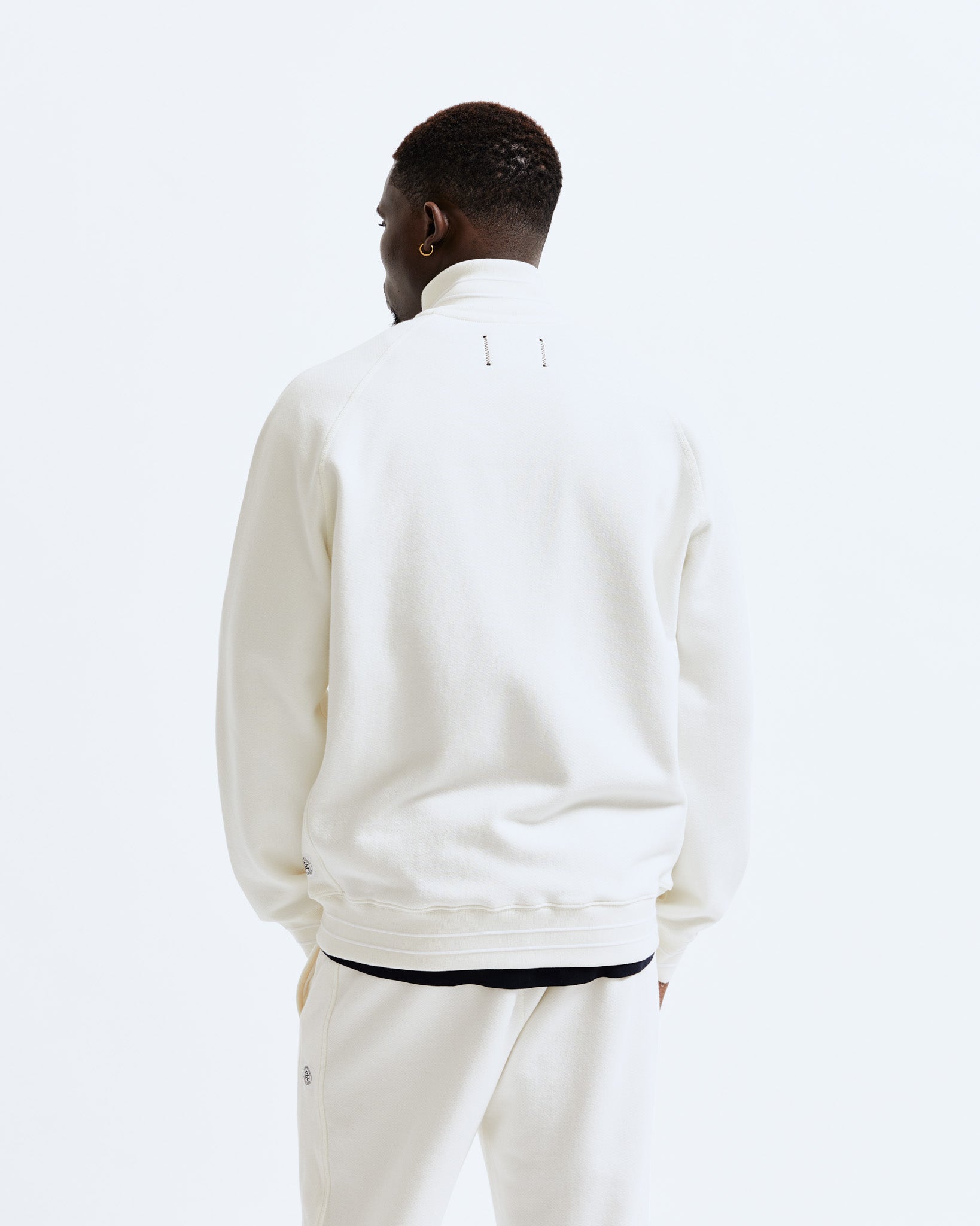 Reigning champ track jacket on sale