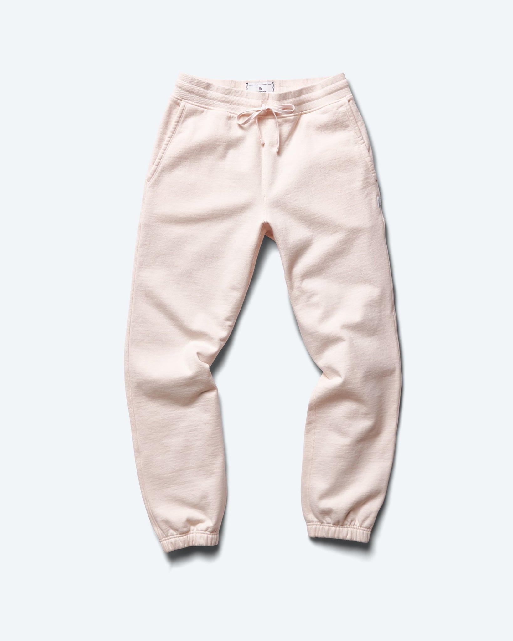 https://reigningchamp.com/cdn/shop/products/heavyweight-fleece-cuffed-sweatpant-pale-pink-Front_Flat.jpg?v=1707768340&width=1920